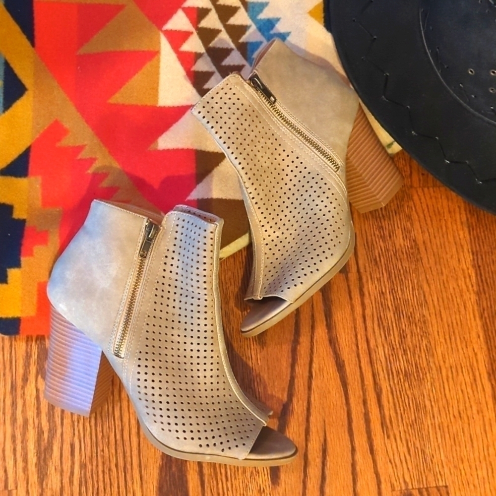 Brash open toe perforated neutral suede stacked heel open toe booties. Sz 9.5